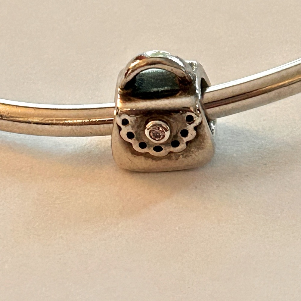 Authentic Pandora purse charm with pink stone